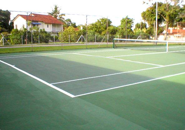 Jabatan Kerja Raya (JKR)'s one outdoor tennis court using Plexipave coating for its staff quarters